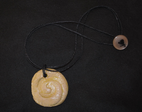 Clay Imprinted Pendant on rope