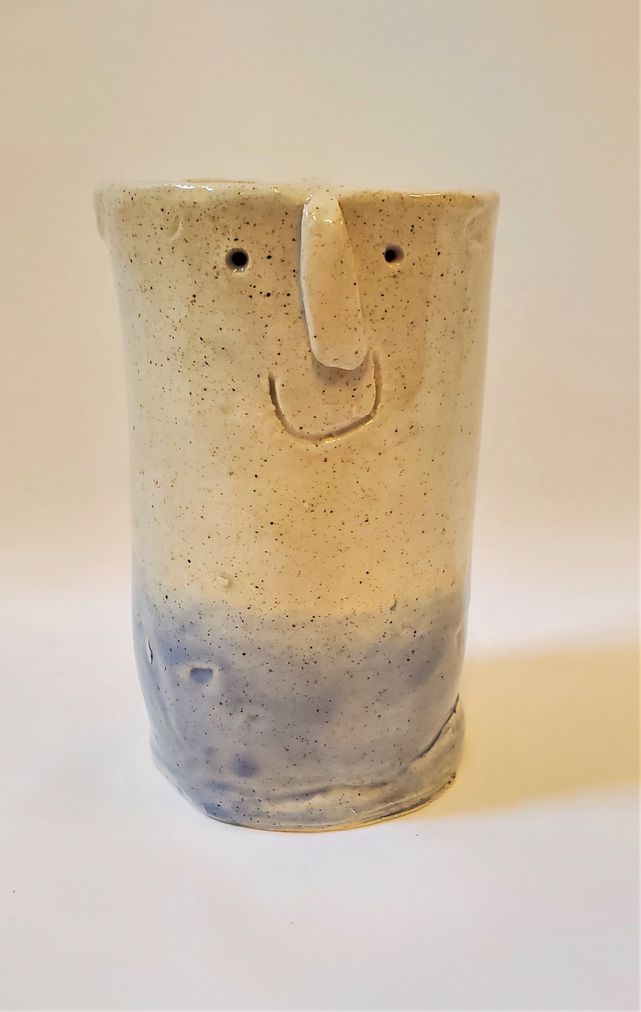 Blue and Tan Face Planter